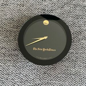Movado Black and Gold Clock